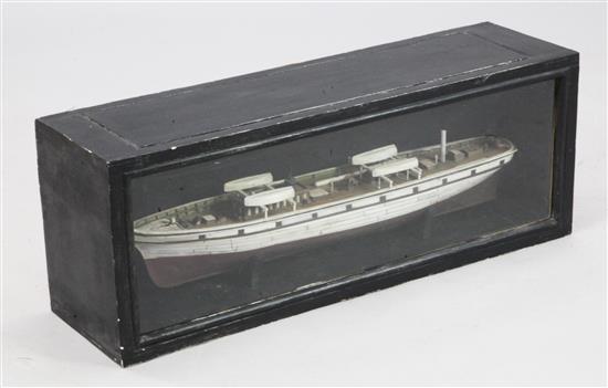 A scratch built wood and bone model of a schooner, overall width 32in. height 12in.